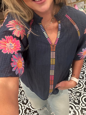 Floral embroidered blue top