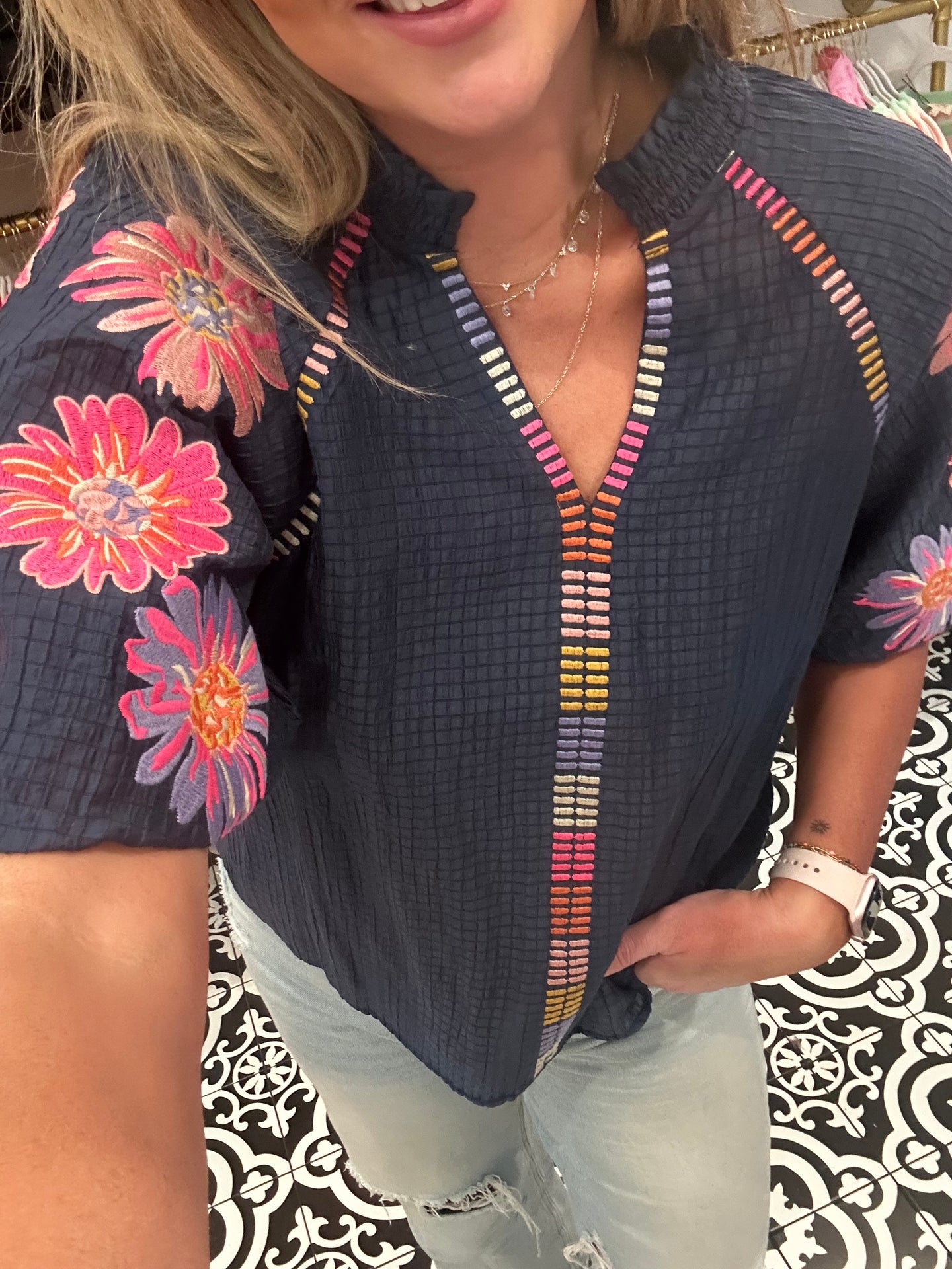 Floral embroidered blue top